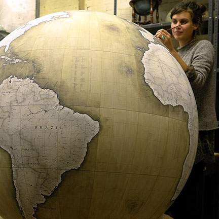 Jade Fenster hand-painting a globe at Bellerby & Co globemakers