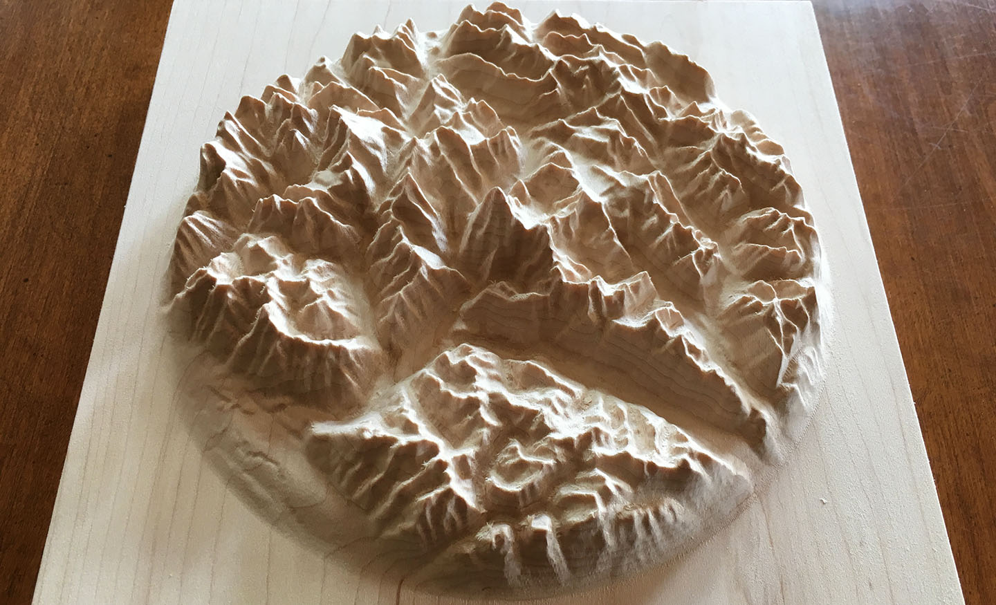 three-dimensional wood-carved relief map of the Canadian Rockies around Mount Robson, British Columbia, Canada
