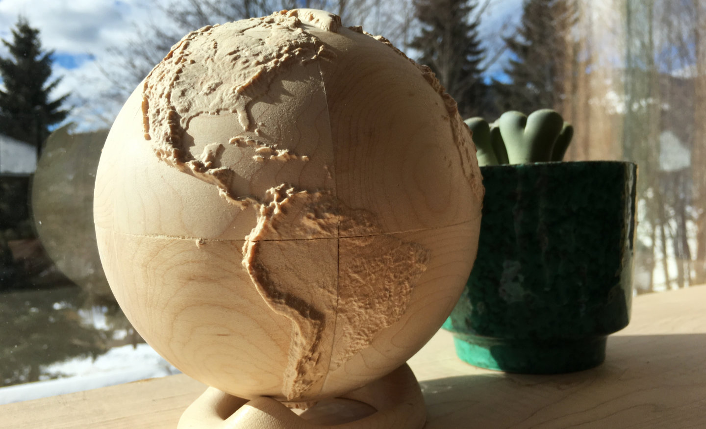 fully three-dimensional 6-inch wood-carved terrestrial relief globe
