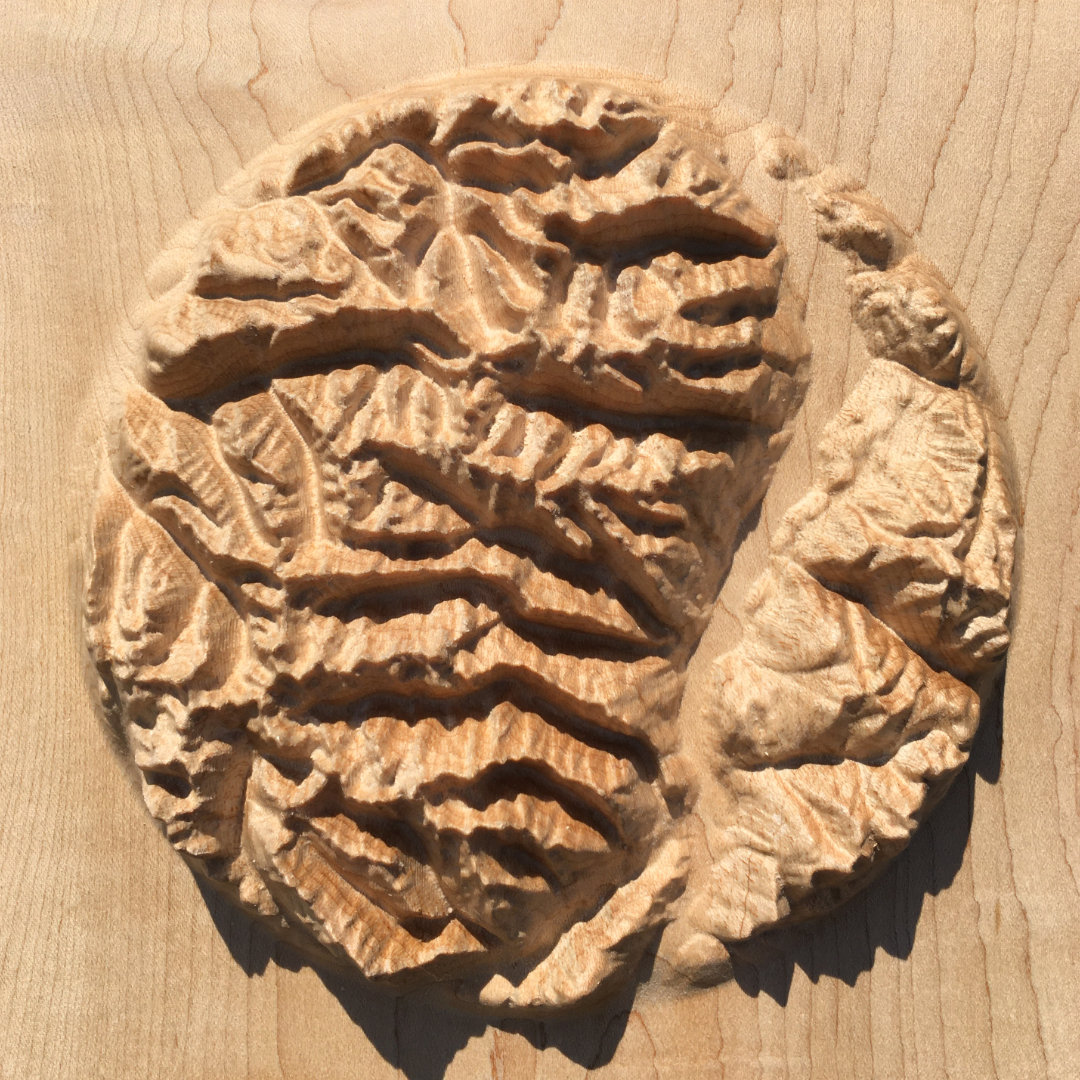 overview of three-dimensional wood-carved relief map of the mountains of Valhalla in the Kootenays, British Columbia, Canada