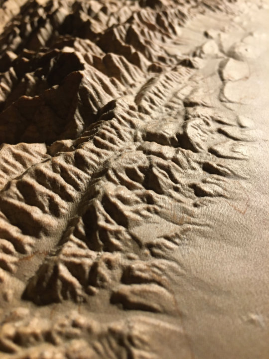 detail of three-dimensional wood-carved relief map of the San Gabriel Mountains in Los Angeles County and San Bernardino County, California, United States