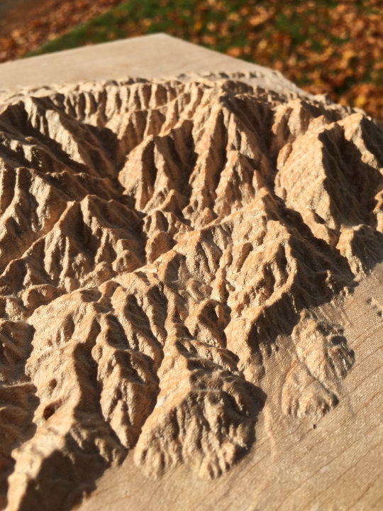 detail of three-dimensional wood-carved relief map of the San Gabriel Mountains in Los Angeles County and San Bernardino County, California, United States