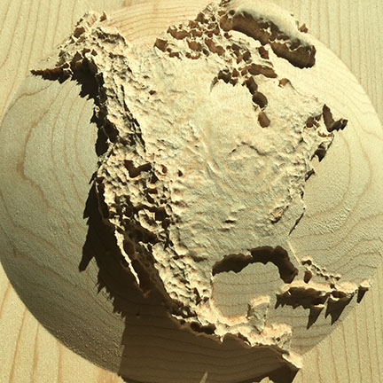 goodwoodglobes continent dome showing North America carved into maple wood