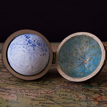 blue and white porcelain lunar globe from The Little Globe Co in an oak pocket case with a celestial interior