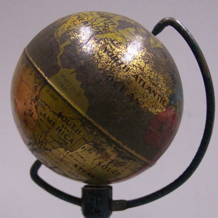 Slightly faded antique miniature globe from Murray Hudson